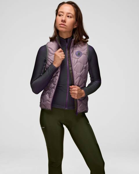 Model is wearing a size XS vest and long sleeve